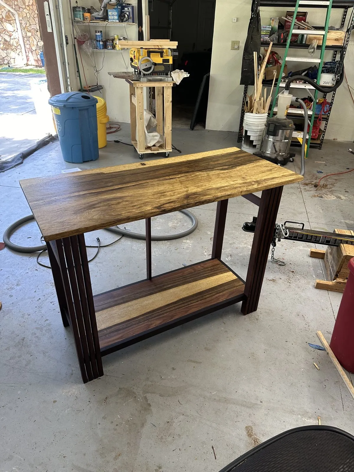 A wood console table David built, in the workshop.