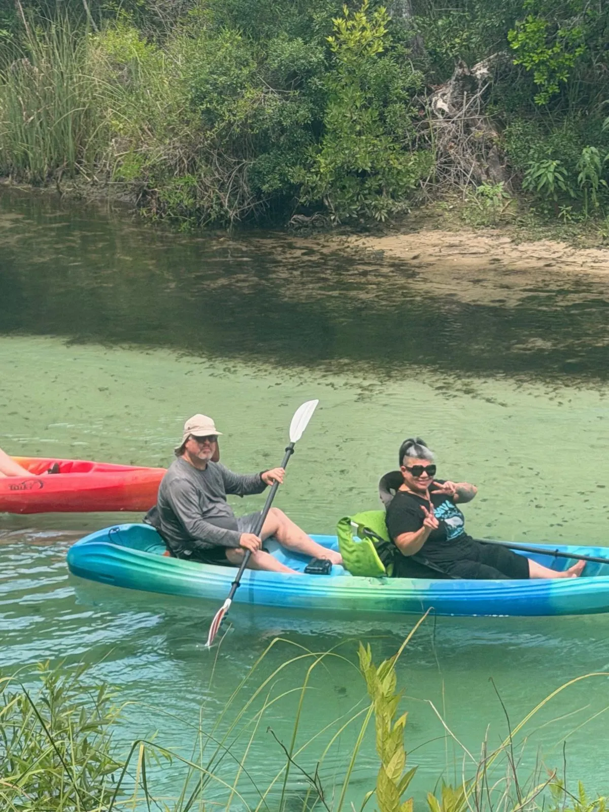 David and family kayaking on a spring-fed river.
