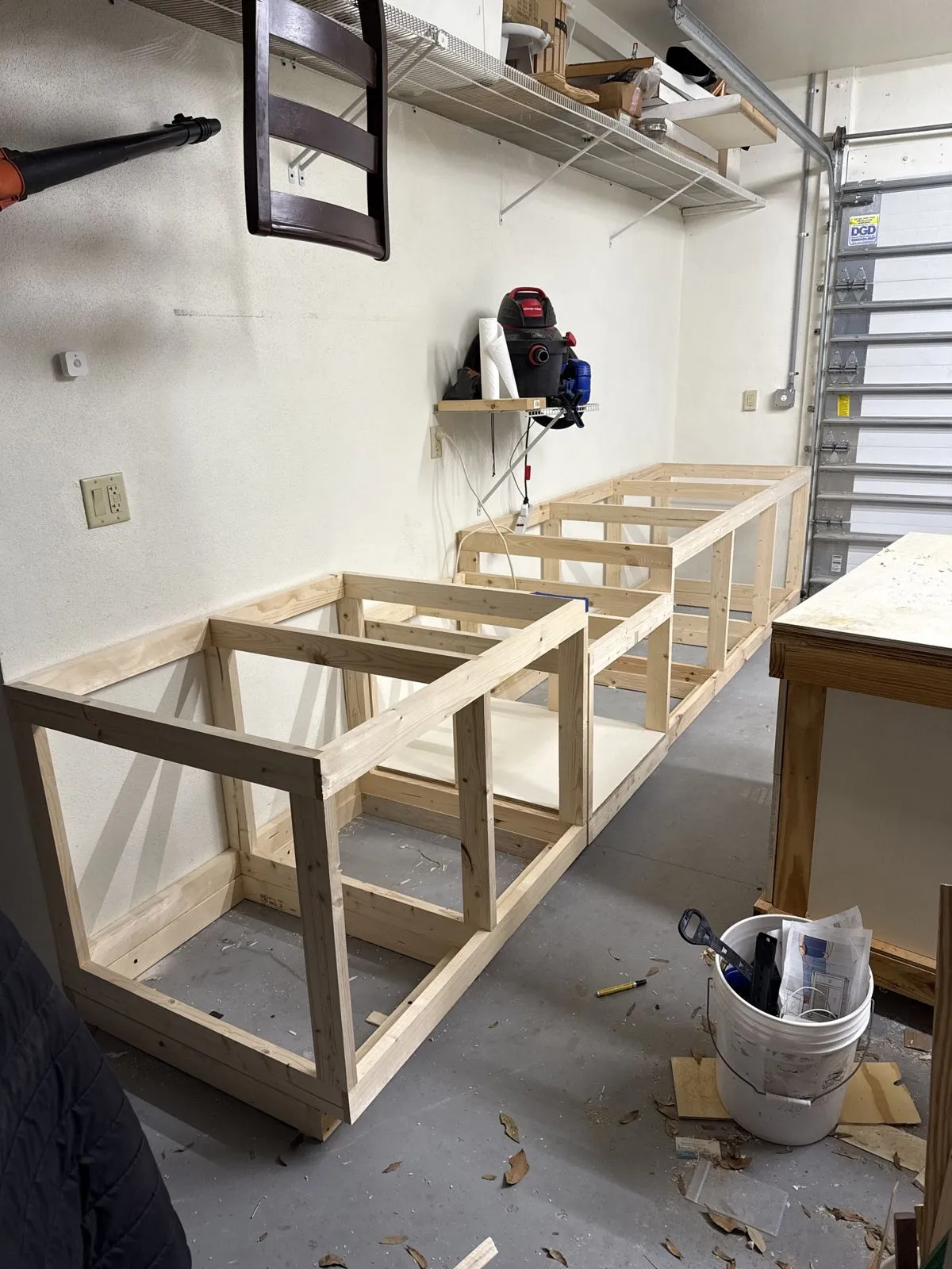 A large workbench under construction in the shop.