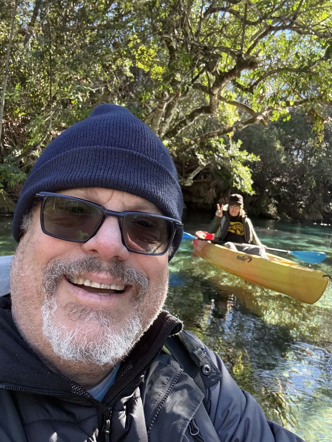 David kayaking on a clear, spring-fed river.