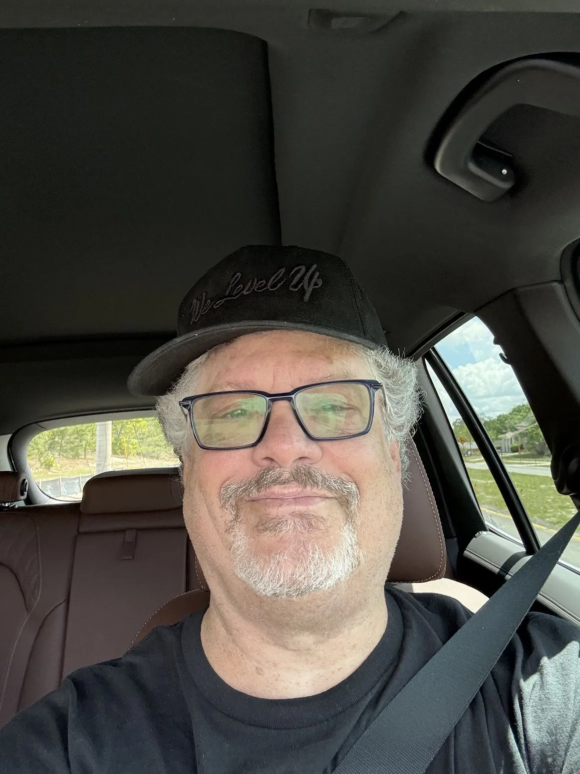 David out and about, smiling.